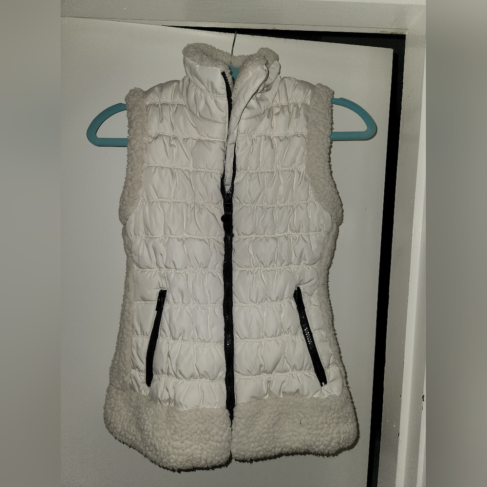 *White Calvin Klein performance vest with black zipper.* BOGO eligible!